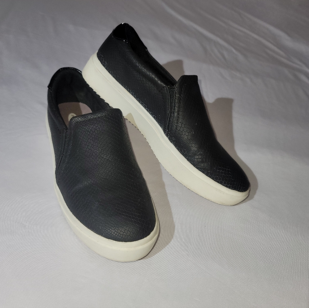 Dr. Scholl's synthetic leather shoes.